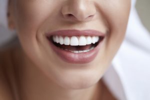 Healthy white smile close up. Beauty woman with perfect smile